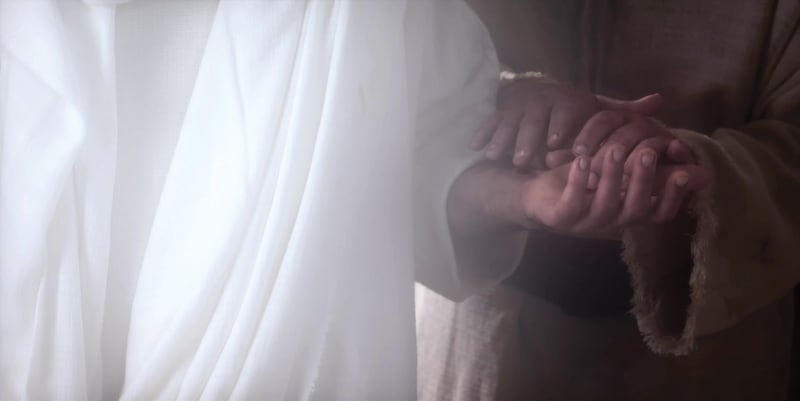 Jesus Christ invites people to touch the wounds in His hands in this scene from the Bible Videos.
