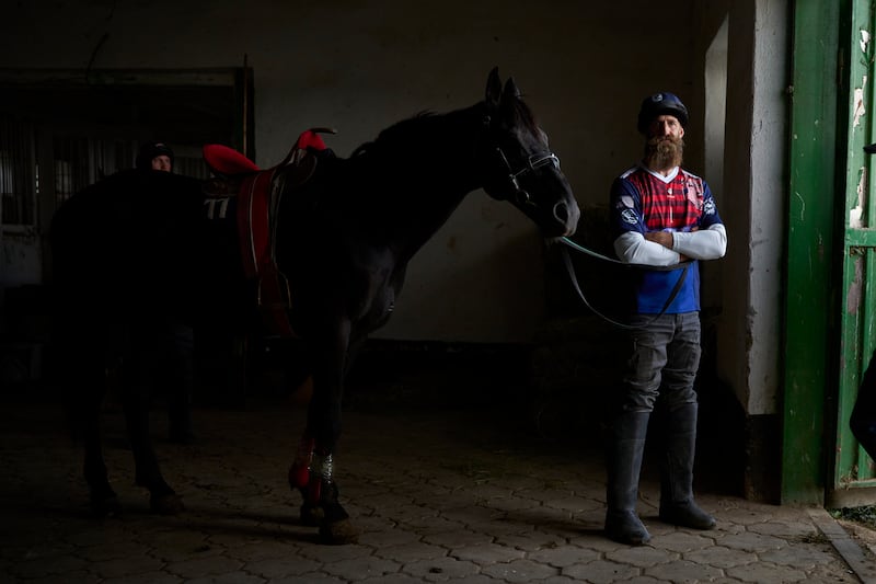 Ladd Howell, Kok-Boru Team USA captain and a Latter-day Saint returned missionary, stands in his uniform next to a horse during the sixth World Nomad Games, held Aug. 31 to Sept. 6, 2026, in Bishkek and Cholpon-Ata, Kyrgyzstan.