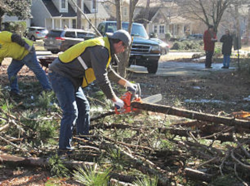 A chain saw is a critical tool in helping clean up tree limbs and branches in the Augusta, Ga., are
