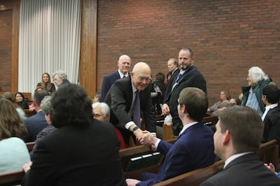 President Dallin H. Oaks, first counselor in the First Presidency, greets members before a Holladay Region Mid-Single Adult Fireside on Jan. 13, 2019.