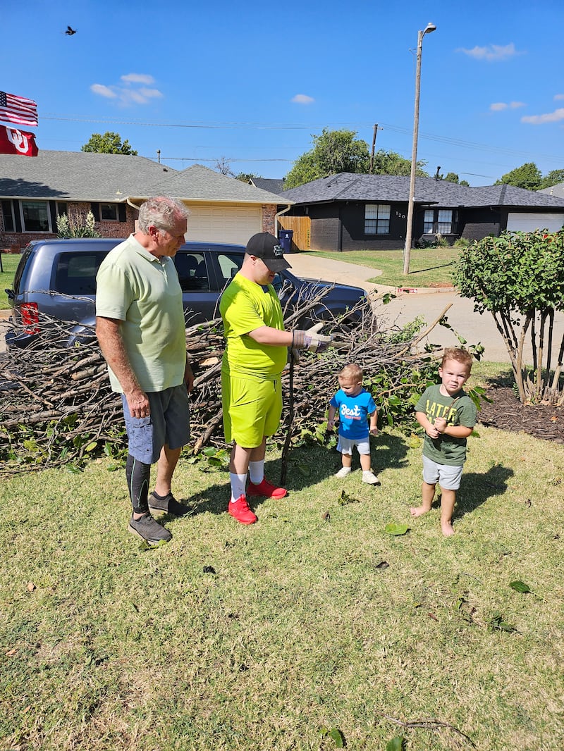 Elder Welch helps clean up a neighbors yard in Huntington, West Virginia on _____.