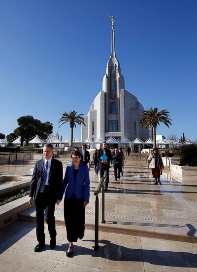 Elder David A. Bednar of the Quorum of the Twelve Apostles and his wife, Sister Susan Bednar, walk from the Rome Italy Temple to the Rome Temple Visitor’s Center of The Church of Jesus Christ of Latter-day Saints on Monday, Jan. 14, 2019. Rome City officials and other dignitaries follow behind.