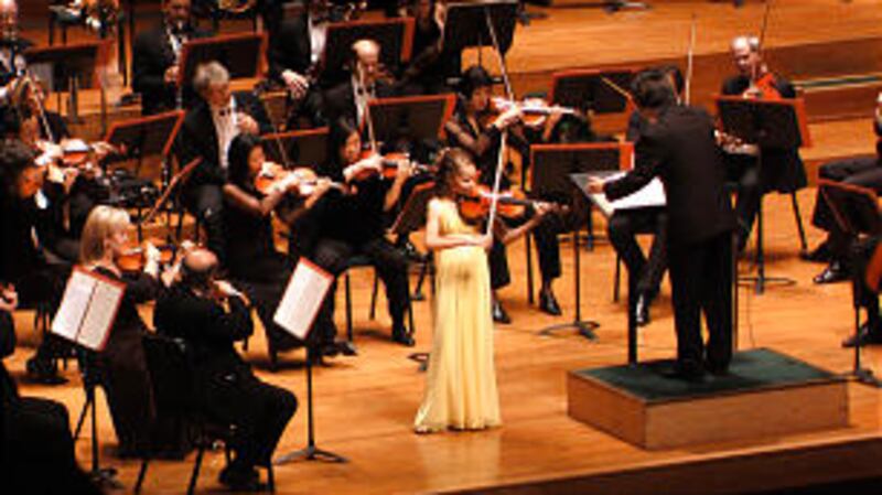 Aubree Oliverson performs with the Utah Symphony in 2009. She will play at Carnegie Hall on March 6.