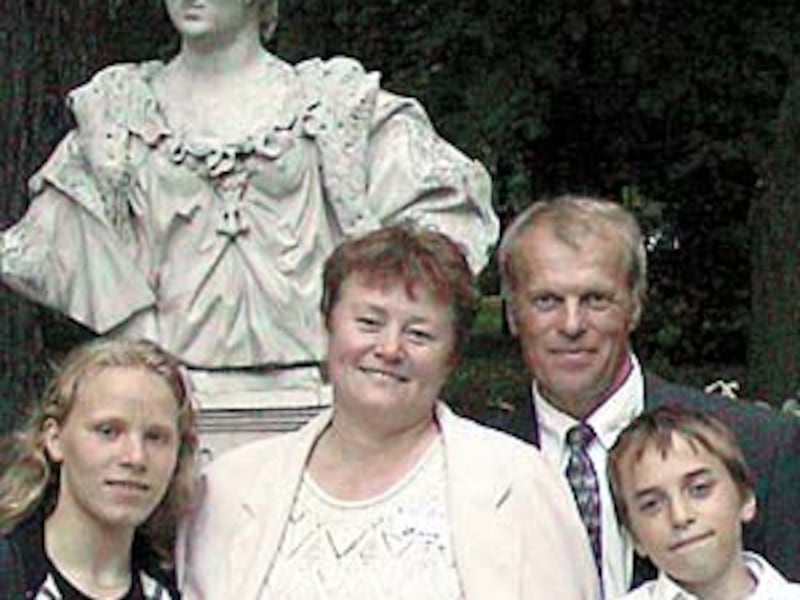 Mikhail Ignatiev, president of the Shuvolovsky Branch, his wife, Irina, with two of their eight chil