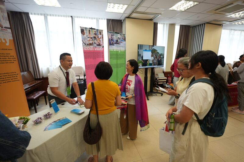 Participants visit booths at the Asia Area education fair in Kuala Lumpur, Malaysia, Oct. 25, 2025.