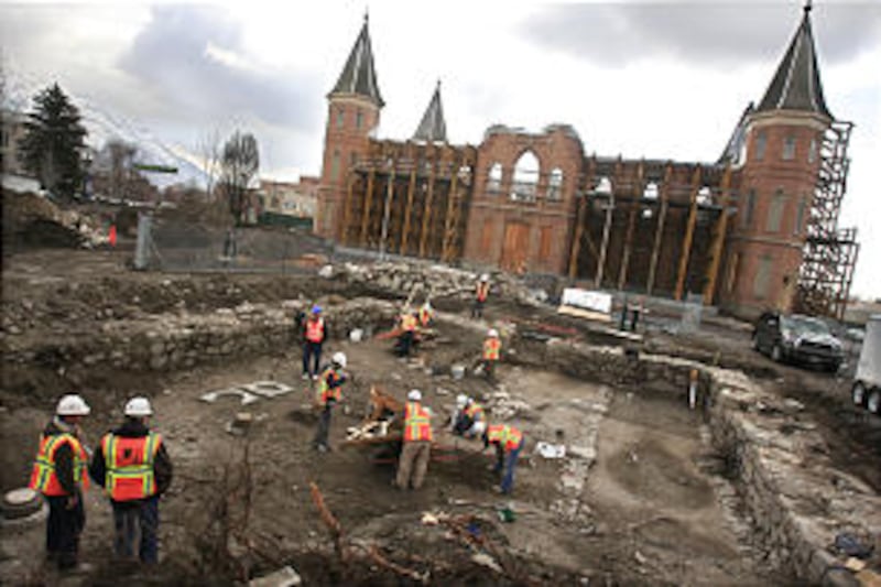 Workers continue to uncover the original Provo Tabernacle foundation on Thursday, Feb. 16, 2012. Stu