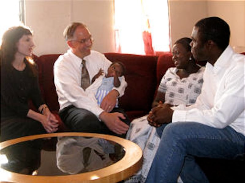 Elder and Sister Andersen visit with Bishop Alexander K. Baidoo, of the Christiansborg Ward, Accra G