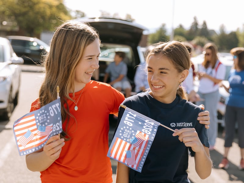 JustServe volunteers celebrate the delivery of a truckload of food from The Church of Jesus Christ of Latter-day Saints to the Partners INW food pantry in Spokane Valley, Washington, on Thursday, June 25, 2026.