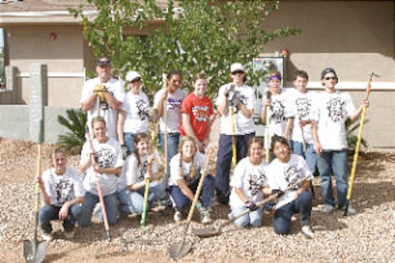 Gilbert Arizona Stake youth pause for a picture during joint service project. They joined youth fro