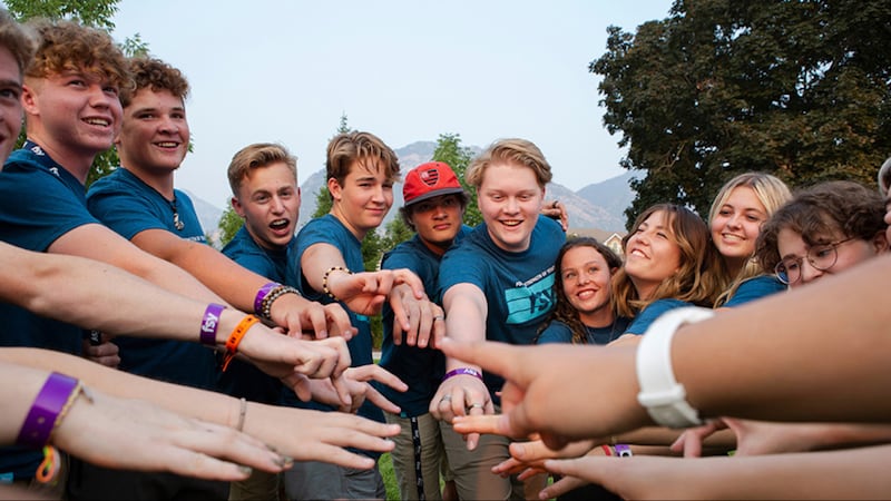 A group of youth participates in an activity at a For the Strength of Youth or FSY conference.
