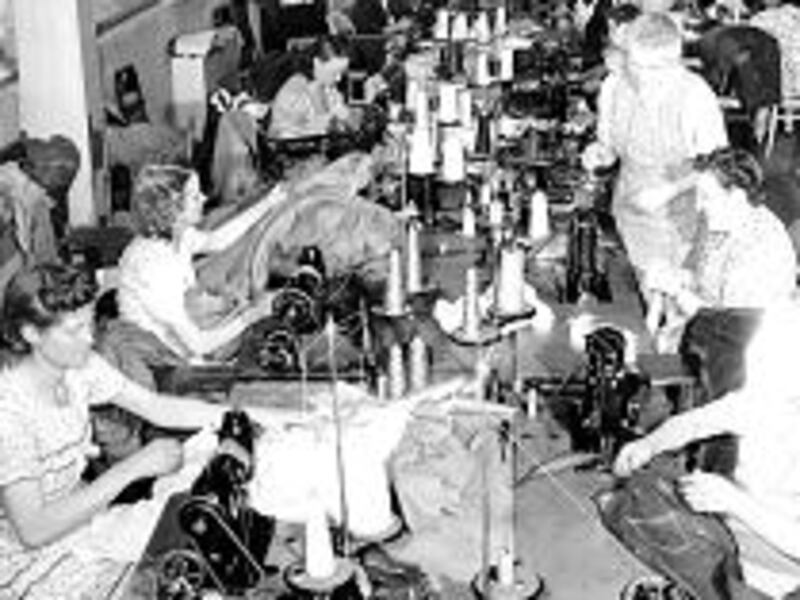 Women sew at Welfare Square in early 1950s, about the same time a young Bishop Thomas S. Monson took