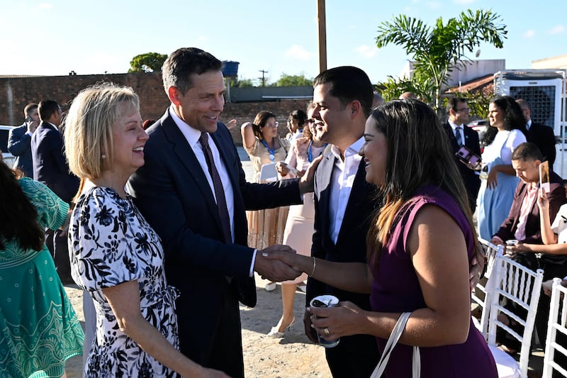 Elder B. Corey Cuvelier of the Brazil Area presidency and his wife, Sister Wendi Cuvelier, greet guests at the groundbreaking ceremony for the Maceió Brazil Temple.