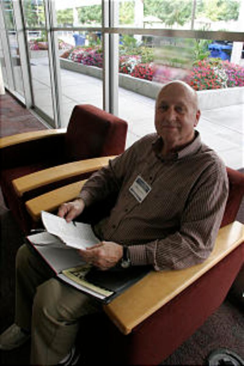 Stephen Draper from Holladay, Utah, sits in the Conference Center on the BYU Campus in between class