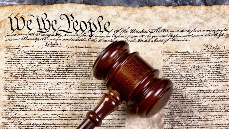 The U.S. Constitution with a gavel.