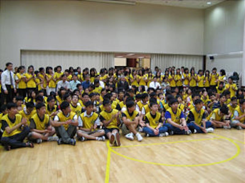 Youth from four stakes in Hong Kong gather, joined by parents and leaders, at the Asia Area administ