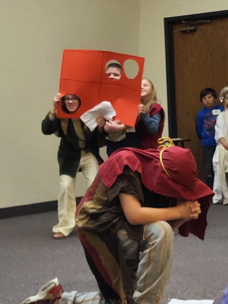 Valiant-age children in the Orem Utah Stake take part in a skit about Daniel praying during a Primary activity in Orem, Utah, on March 14, 2026.