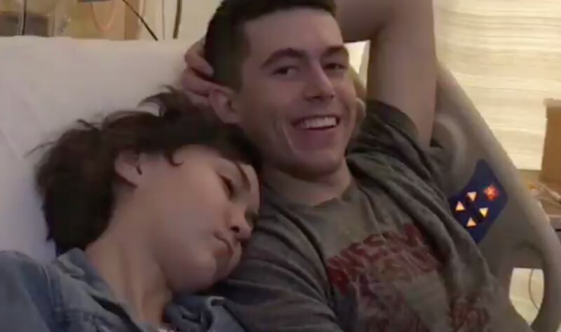 Lexi and Ricky Stafford enjoy a quiet moment during Ricky’s recent cancer treatment.