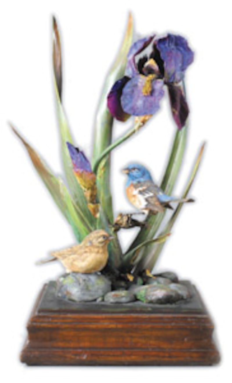 President Packer's carving "Lazuli Bunting, Irises" captures the Church leader's love for nature and