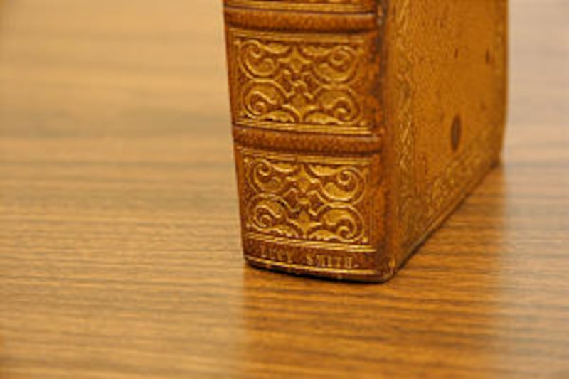 Lucy Mack Smith's name is imprinted on Book of Mormon spine, identifying it as her presentation copy