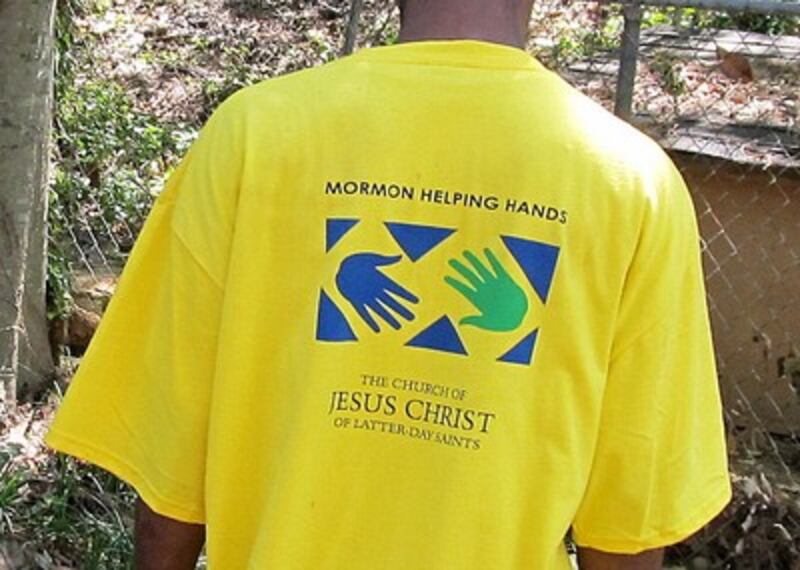 Volunteers wearing yellow Mormon Helping Hands T-shirts responded to the call to help clean areas hi