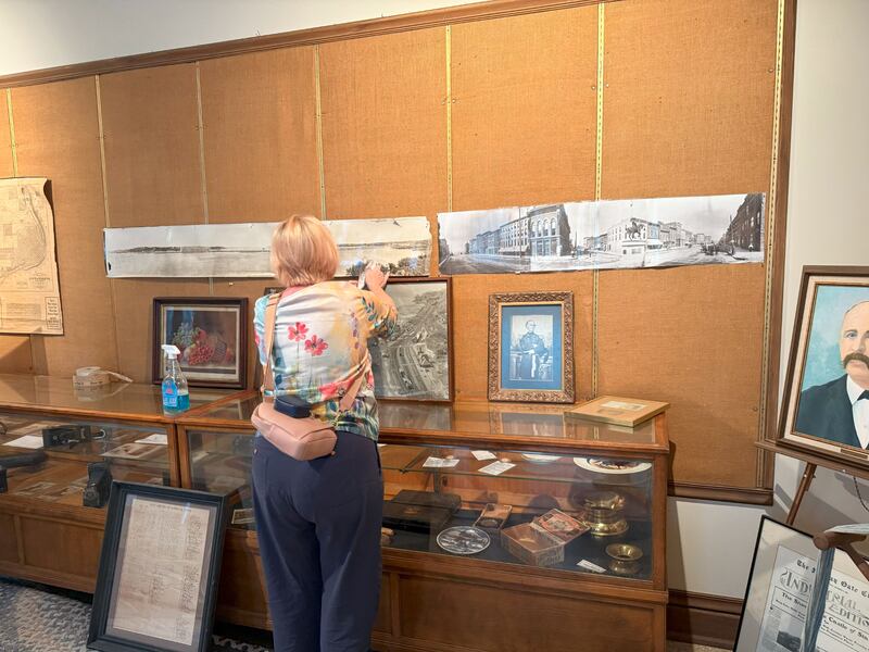 A woman cleans the Miller House Museum in Keokuk, Iowa, on Sept. 20, 2025, as part of a service project organized in conjunction with the Nauvoo Mega Conference for Single Adults held in Nauvoo, Illinois.