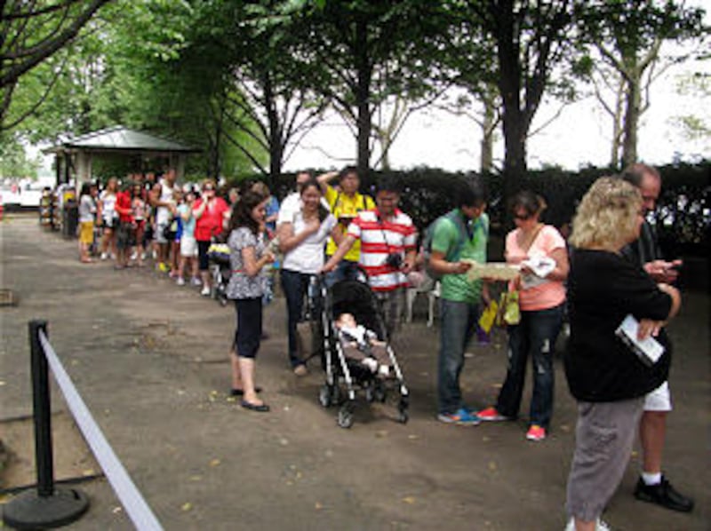 Visitors from the United States and from many countries wait in a long line to visit Family History