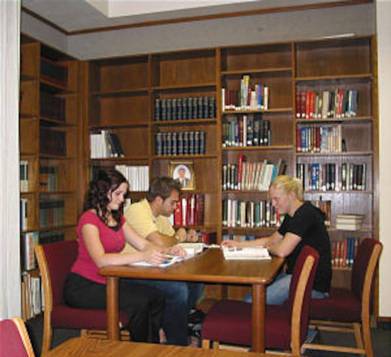 Kelli Soard, above left, meets her student-husband, Zachary, for lunchtime study in Las Vegas Instit