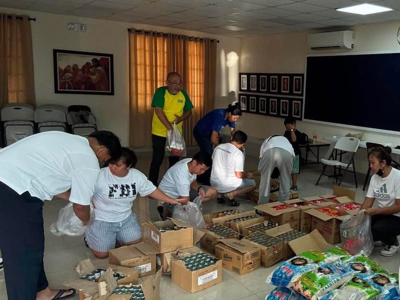 Local members of The Church of Jesus Christ of Latter-day Saints prepare to transport 200 food kits in a rented boat from General Santos City to units in Glan and Alabel on June 10, 2026, following the recent 7.8 magnitude earthquake in Mindanao, Philippines.