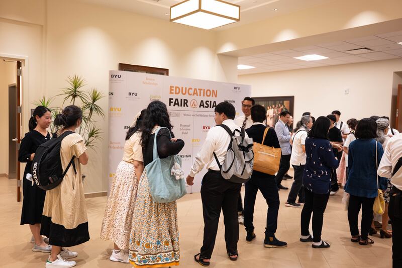 Attendees join the registration line to participate in the Asia Area education fair held in Bangkok, Thailand, Oct. 19, 2025.