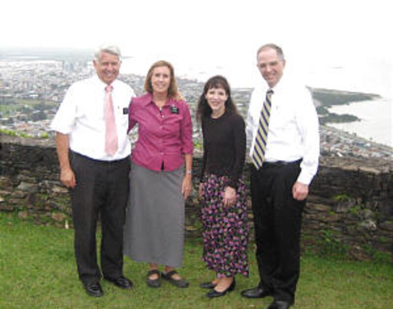 West Indies Mission President Reid A. Robison, left, wife, Diane, and Elder Neil L. Andersen with hi