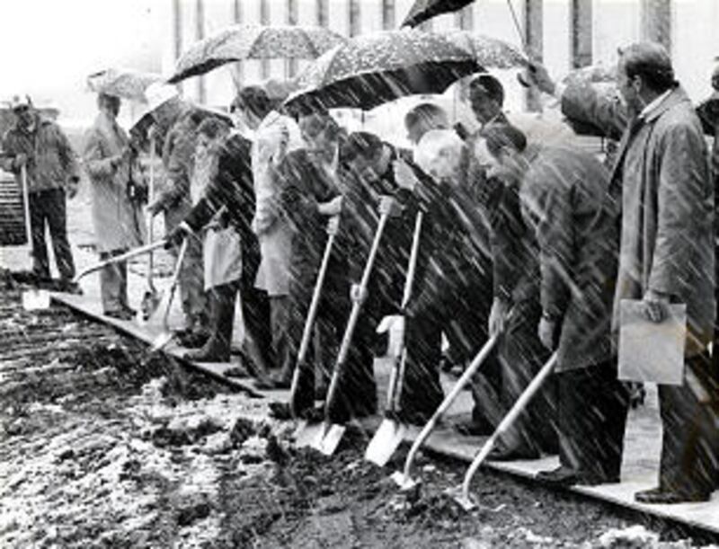 Amid swirling snow, officials and contractors break ground for new Genealogical (Family History) Lib