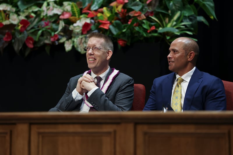 Luke Nichols sits on the stand with BYU–Hawaii President John S.K. Kauwe III prior to speaking in the campus devotional in Laie, Hawaii, on Tuesday, Sept. 29, 2026.