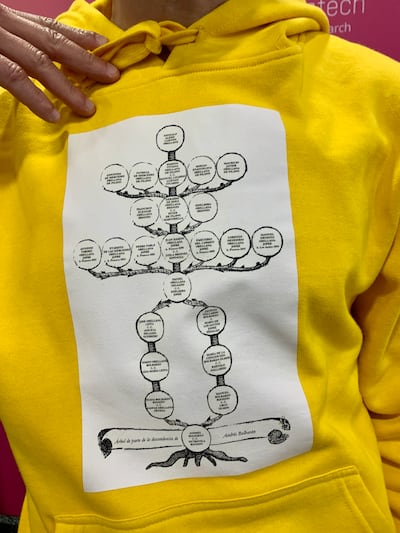 Gonzalo Luengo, a genealogist from Chile, shows off a custom-designed hoodie featuring his family tree at RootsTech.