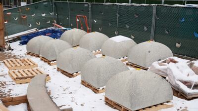 Stones on top of the upper walls of the temple were removed in January 2021 as part of the Salt Lake Temple renovation project in Salt Lake City, Utah. The stones were lifted off with a crane, placed on the ground and labeled. They will be cleaned and repaired before returning to their original places on the temple.