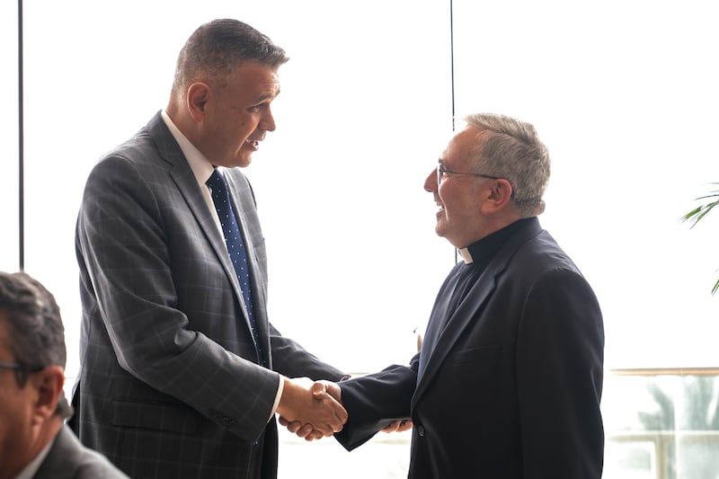 Elder Juan Pablo Villar, a General Authority Seventy and president of the Church's South America Northwest Area, shakes hands with a faith leader at the first International Symposium on Religious Freedom in Lima, Peru, Aug. 4-5, 2026.