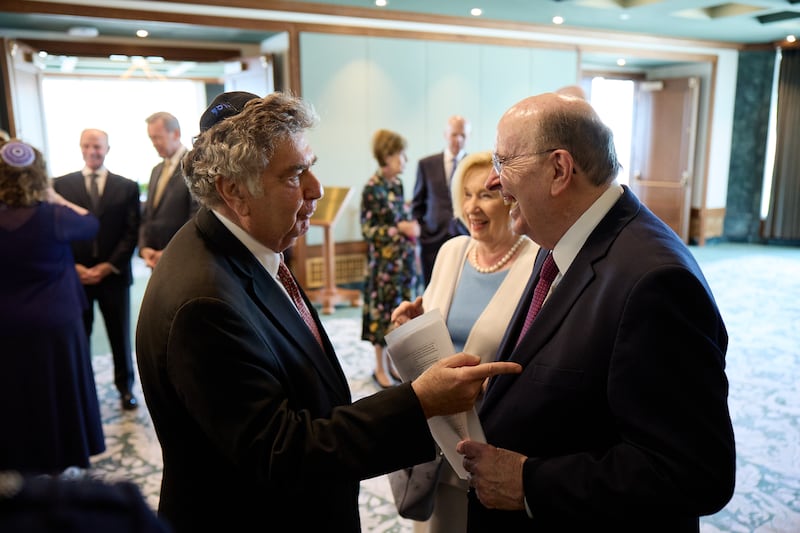 Elder Quentin L. Cook and his wife, Sister Mary Cook, greet Rabbi Joseph Potasnik.