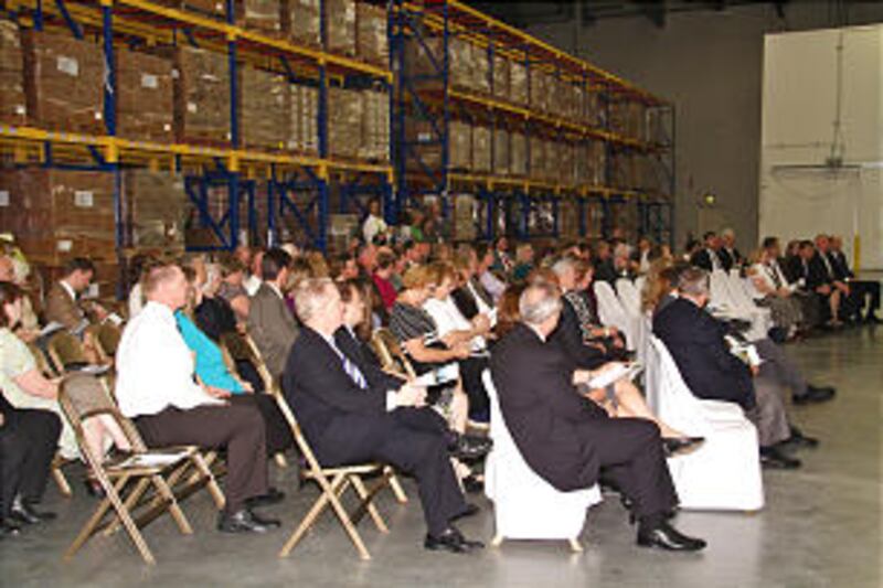 Church members attend the dedication of the Bishops' Central Storehouse in Mira Loma, Calif. Elder D