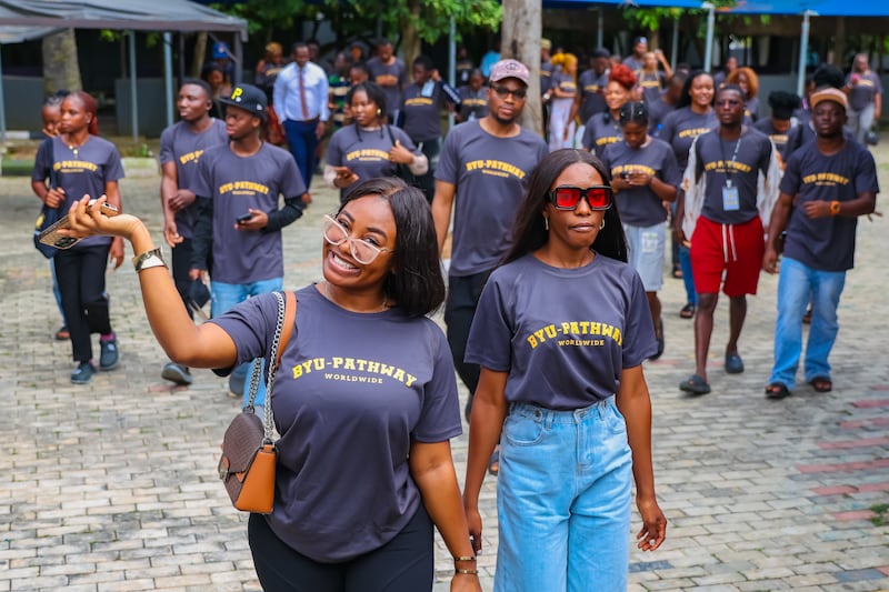 BYU–Pathway Worldwide students and other young single adults and their friends gather for YSA summit in Lagos, Nigeria, Oct. 31, 2025.