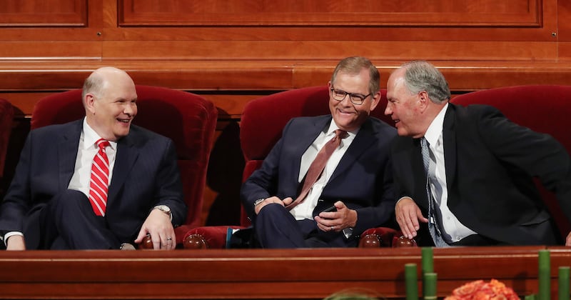 Elder Dale G. Renlund, left, Elder Gary E. Stevenson and Elder Ronald A. Rasband of the Quorum of the Twelve Apostles talk prior to the Sunday afternoon session of the 188th Semiannual General Conference of The Church of Jesus Christ of Latter-day Saints in the Conference Center in Salt Lake City on Sunday, Oct. 7, 2018.