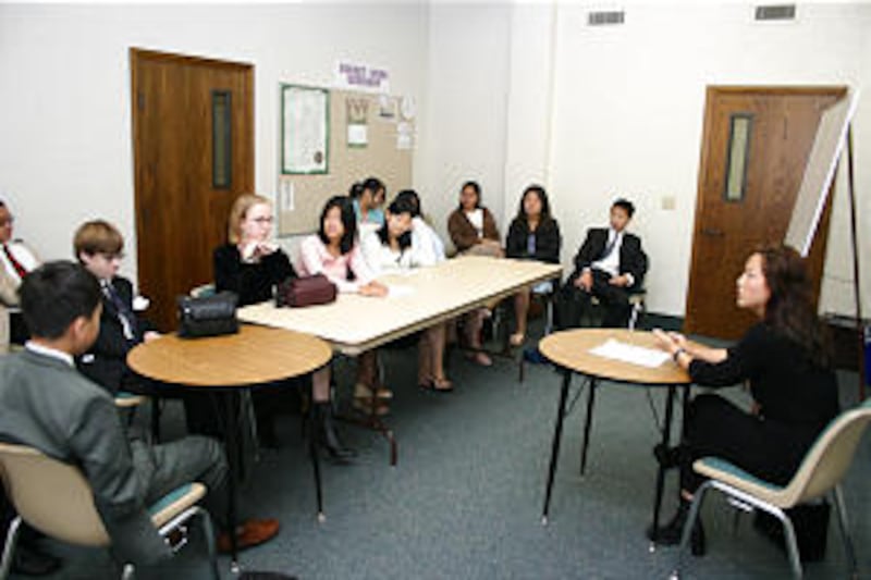 Mireille Freebairn teaches Sunday School class of youth from Sunset Ward and San Francisco Chinese