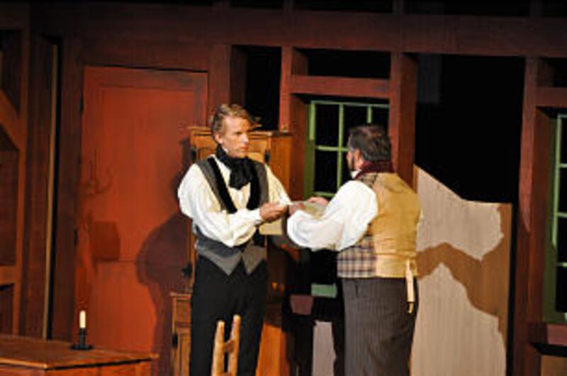 Cast members enact scene from "Martin Harris, the Man Who Knew." The musical is presented near Clark