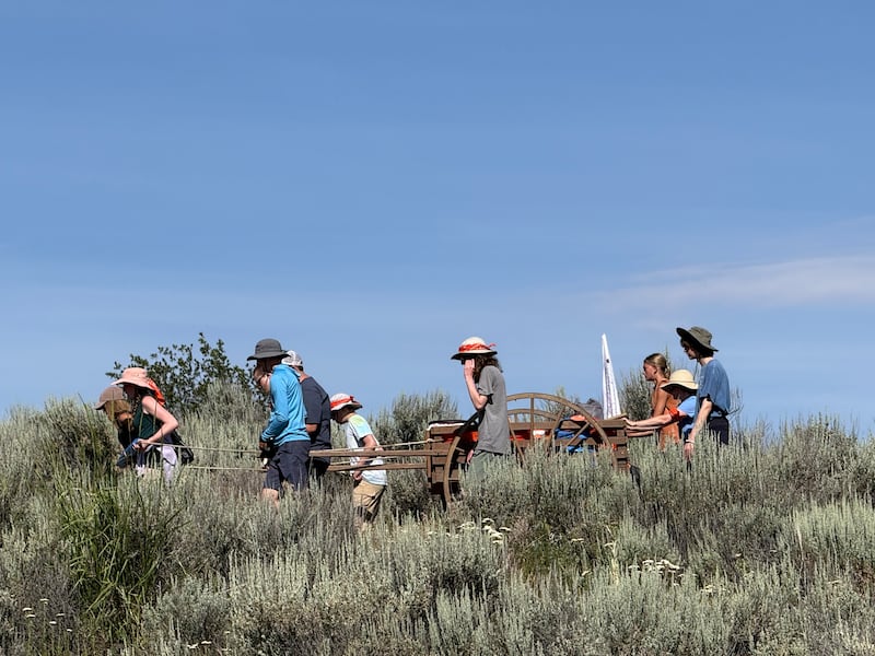 Youth of the Spokane Washington Valley Stake pull hand carts across the Drybuck Mountain in Bend, Idaho during Trek on June 25, 2026.