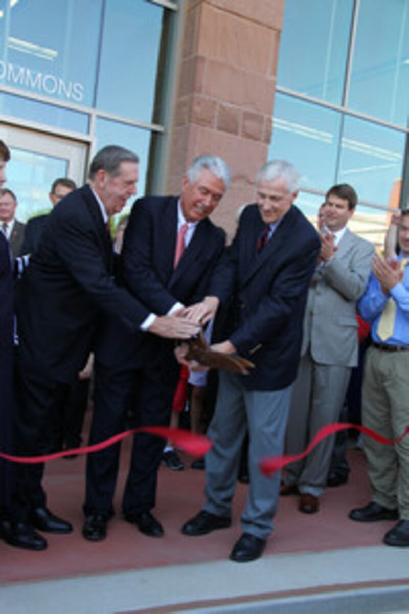 Elder Jeffrey R. Holland, President Dieter F. Uchtdorf and Utah Lt. Governor Greg Bell cut ribbon fo