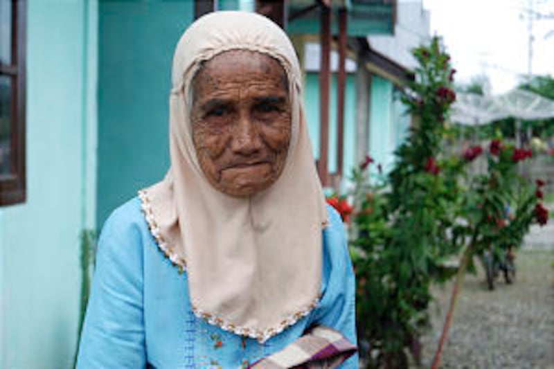 Women receives new home from LDS Church after tsunami.
