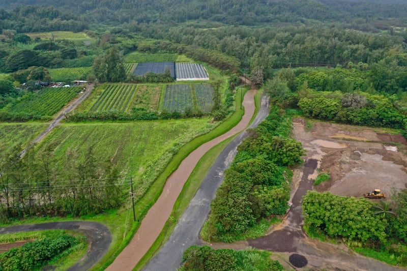 A view of Wailele Stream, behind the Polynesian Cultural Center in Laie, Hawaii, on Tuesday, March 9, 2021. Officials warned residents to stay away from areas prone to flooding, including streams and low-lying areas. Photo by Spencer Ingley.