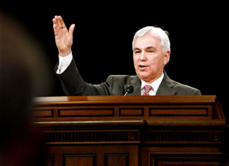 Elder Claudio RM Costa speaks at a BYU devotional.