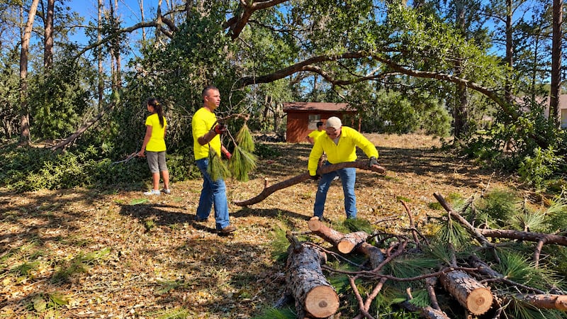 Latter-day Saint volunteers help neighbors and friends clean up following Hurricane Isaias in Pensacola, Florida, on Saturday, Oct. 17, 2026.