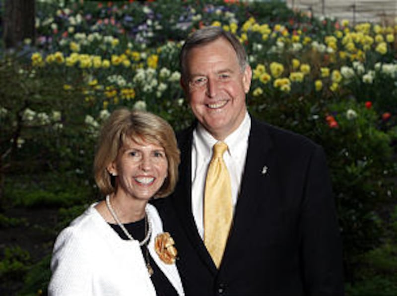 Sister Carol F. McConkie, first counselor in the Young Women general presidency, stands with her hus