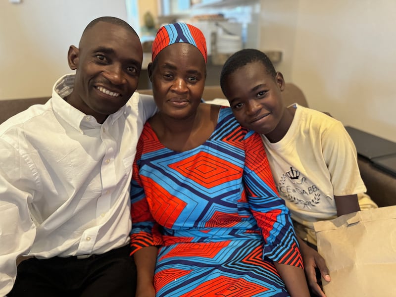 Kilford Shereni and his wife and son.