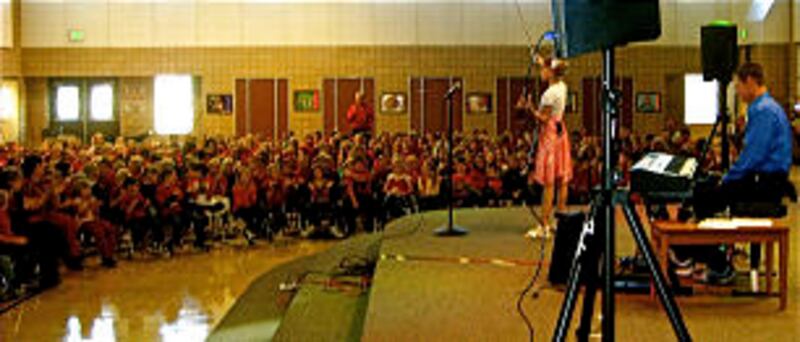 Aubree Oliverson participates in a school assembly.